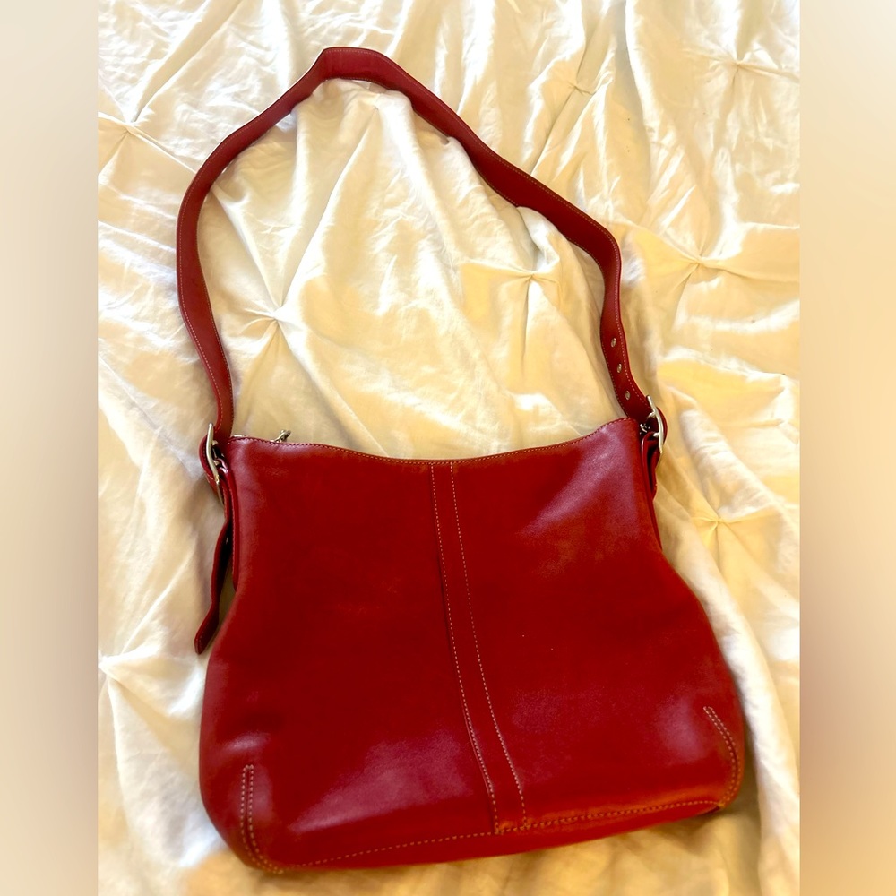 Red authentic leather coach satchel.